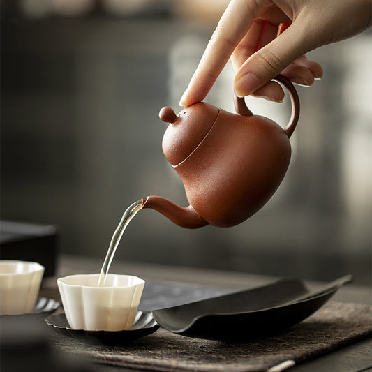 Purple clay teapot